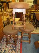 THREE UPHOLSTERED PUB STOOLS