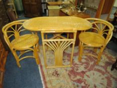 A MODERN CONSERVATORY TABLE AND TWO CHAIRS