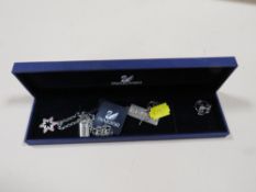 A BOXED SWAROVSKI BRACELET TOGETHER TIH A SILVER INGOT ETC