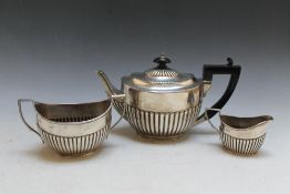 A HALLMARKED SILVER THREE PIECE TEA SERVICE BY WILLIAM HUTTON & SONS LTS - LONDON 1899, approx