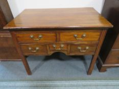 AN ANTIQUE MAHOGANY FIVE DRAWER LOW BOY, raised on straight supports, H 72 cm, W 89 cm