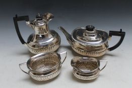A MATCHED HALLMARKED SILVER FOUR PIECE TEA AND COFFEE SERVICE, various dates and makers, approx