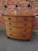 A 19TH CENTURY MAHOGANY BOW FRONTED CHEST OF TWO SHORT ABOVE THREE LONGER GRADUATED DRAWERS, with
