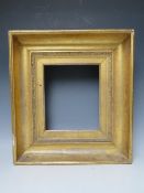 AN 18TH CENTURY GOLD FRAME, with design to inner edge, frame W 10 cm, rebate 27 x 23 cm