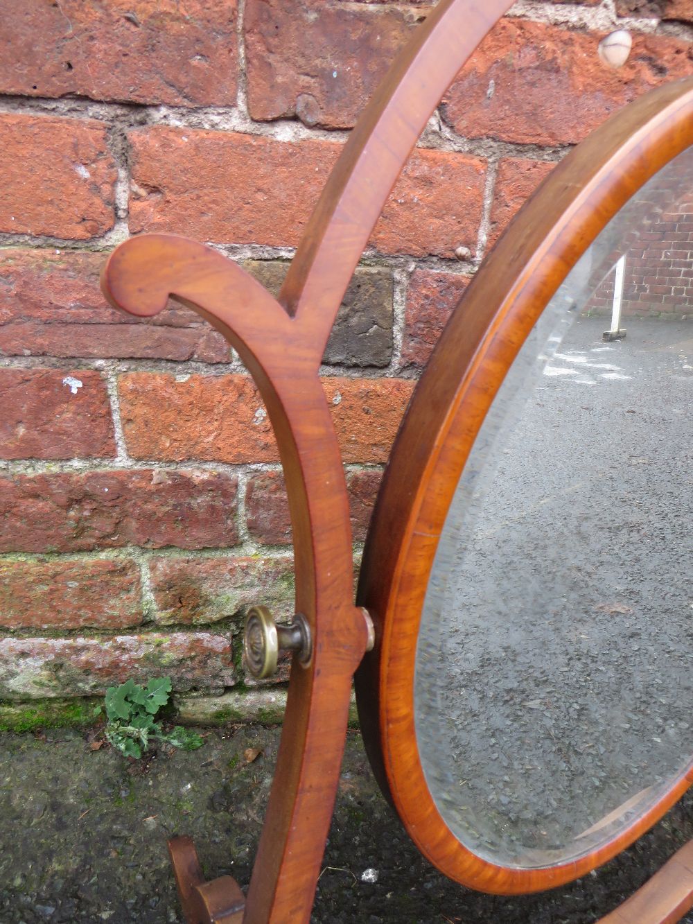 A LATE 19TH CENTURY MAHOGANY DRESSING MIRROR, the oval mirror supported on a shaped framed, H 76 cm - Image 2 of 3