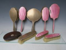 A COLLECTION OF HALLMARKED SILVER DRESSING TABLE ITEMS, comprising a five piece set with pink