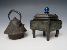 A 20TH CENTURY CAST IRON JAPANESE TEAPOT, together with a brass lozenge shaped casket, the teapot