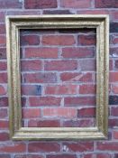 A 19TH CENTURY GOLD FRAME WITH INNER DESIGN, frame W 8.5 cm, rebate 69 x 53 cm