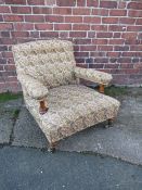 A LARGE UPHOLSTERED OPEN ARMCHAIR, in the style of Howard & Sons, the back leg stamped '4470 4072'