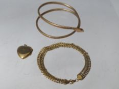 A GILT METAL SNAKE ARM BANGLE, together with a decorative link bracelet stamped 925 and a 9ct gold