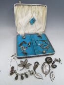 A COLLECTION OF VINTAGE SILVER AND WHITE METAL COSTUME JEWELLERY, to include a Siam silver brooch