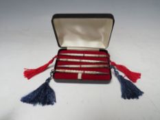 A CASED SET OF FOUR STERLING SILVER BRIDGE PENCILS