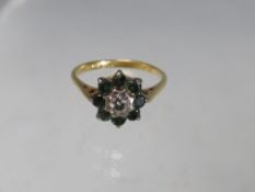 AN 18CT GOLD EMERALD AND DIAMOND CLUSTER DRESS RING, ring size Q, approximately 3.85 g