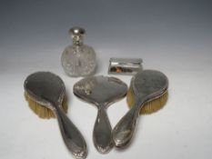 A HALLMARKED SILVER LIDDED GLOBULAR PERFUME BOTTLE, (hallmarks rubbed), complete with glass stopper,