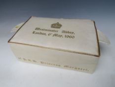 A CREAM LEATHER COVERED HASSOCK, from the marriage of Princess Margaret and Anthony Armstrong