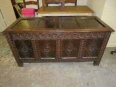 AN 18TH CENTURY OAK PANELLED AND CARVED COFFER, H 73 cm, W 153 cm