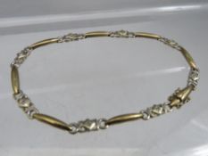 A 9CT WHITE AND YELLOW GOLD GEMSET BRACELET, approximately 6.8 g