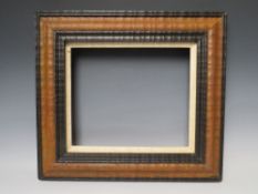 A 20TH CENTURY DUTCH EBONISED AND STAINED FRAME, with painted slip, frame W 7.5 cm, slip rebate 26.5