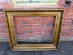 A 19TH CENTURY GILT RECTANGULAR PICTURE FRAME, moulded detail to the frame, rebate 90 x 70 cm