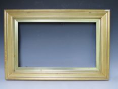 A 19TH CENTURY PLAIN GOLD FRAME WITH GOLD SLIP, frame W 6 cm, slip rebate 35 x 61 cm, frame rebate