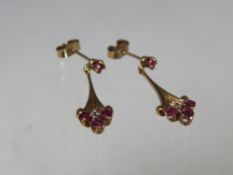 A PAIR OF 9CT GOLD PINK AND CLEAR GEM SET EARRINGS