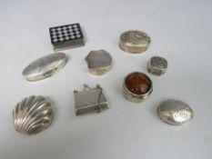 A COLLECTION OF NINE HALLMARKED SILVER AND 925 PILL BOXES, to include a handbag shaped example and a