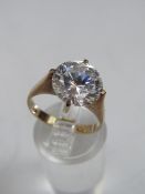 AN 18K GOLD AND CZ SOLITAIRE DRESS RING, ring size L ½, approximately 4 g