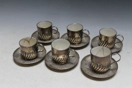 A SET OF SIX HALLMARKED SILVER COFFEE CUPS AND SAUCERS BY WILLIAM HUTTON & SONS LTD - LONDON 1905,