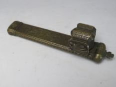 A VINTAGE BRASS ISLAMIC PEN CASE WITH INTEGRAL INKWELL, L 18 cm, W 3 cm