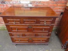 AN ANTIQUE OAK CHEST OF FOUR DRAWERS IN THE JACOBEAN STYLE, each drawer with typical geometric