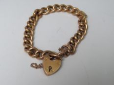 A HALLMARKED 9CT GOLD CHARM BRACELET, lacking charms, marked to individual links, approx 13.2 g