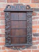 AN EARLY 20TH CENTURY OAK 'PSALMS' ECCLESIASTICAL HYMN BOARD, carved with fruit and floral detail, H