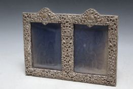 A HALLMARKED PIERCED SILVER DOUBLE PHOTO FRAME - BIRMINGHAM 1903, W 28 cm