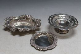 A SMALL HALLMARKED SILVER PIERCED NUT DISH, together with two small 925 silver dishes, approx