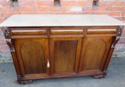 A REGENCY ROSEWOOD MARBLE TOPPED CHIFFONIER, having three frieze drawers above three cupboards,