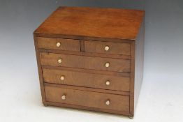A MAHOGANY MINIATURE CHEST OF DRAWS, W 26.5 cm