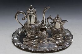 A COLLECTION OF ARABIC 800 STAMPED SILVER TEAWARE, to include a serving tray and set of six