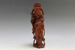 A CARVED CHINESE FIGURE, H 21 cm