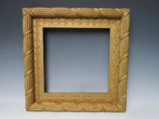 A 19TH CENTURY GOLD ROPE EFFECT FRAME, with decorative gold slip, with restoration, frame W 3.5