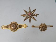 A HALLMARKED 9CT GOLD DIAMOND SET BAR BROOCH, together with a starburst style brooch stamped 9ct (