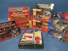 THREE BOXED TRANSFORMERS, to include Siren, Horsehead and Inferno, two Majorette fire engines, two