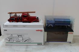 MARKLIN - TWO BOXED DIE CAST VEHICLES, comprising Marklin Metall 19034 clockwork fire engine and