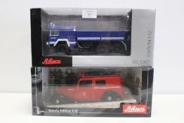 A SCHUCO 1:18 SCALE LIMITED EDITION MECEDES BENZ FIRE VAN, together with Schuco 'ManKatai 6 x 6 THW'
