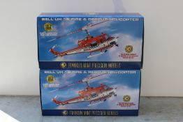 THE FRANKLIN MINT PRECISION MODELS, two boxed limited edition Bell UH - 1B Fire and Rescue