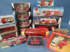 SIXTEEN BOXED FIRE ENGINES, by Motormax, Vitese, Solido etc.