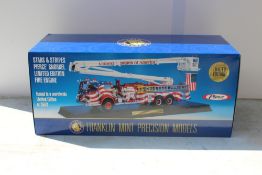 THE FRANKLIN MINT PRECISION MODELS, a boxed Stars and Stripes Pierce Snorkel fire engine, scale 1:32
