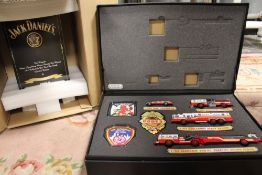A BOXED JACK DANIELS FIRE BRIGADE E-ONE LADDER TRUCK, together with a boxed Code 3 Collectables