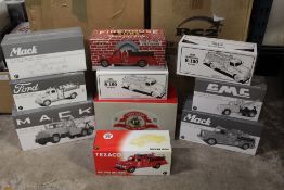 TEN BOXED FIRST GEAR VEHICLES, all 1:34 scale, to include Mack L Series tow truck, L Model pumper,