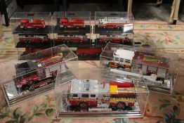 TWELVE CASED CODE 3 COLLECTIBLES FIRE ENGINES, to include FDNY Super Pumper, FDNY Heavy Rescue