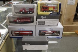 A BOX CONTAINING TWO MODEL CAR 1:18 SCALE EMERGENCY SERVICE VEHICLES, together with two First Gear